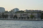 A view of the Dolmabahçe from the Bosphorus with modern Istanbul in the background