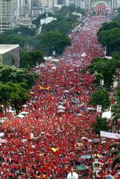 Chvez supporters march through the streets of Caracas on , , urging a 'No' vote in the upcoming recall.