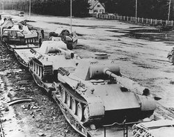 German  tanks de-train in the Eifel area in preparation for the upcoming Ardennes Offensive