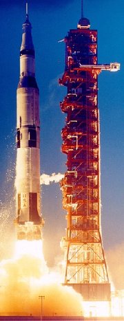 The Saturn V of Apollo 4 rising from the launch pad.