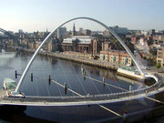 The tilting Gateshead Millennium Bridge from the Baltic Art Gallery
