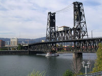 The lower deck of the Steel Bridge is raised to let the sternwheeler 'Rose' pass.