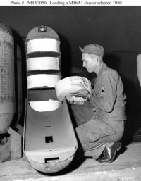 Soldier loads a "leaflet bomb" during the .