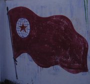 JSS party emblem, on a mural in 