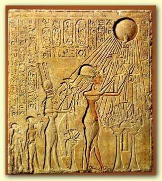 Pharaoh  and his family adoring the Aten