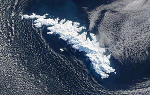 NASA satellite image of South Georgia island covered with snow.