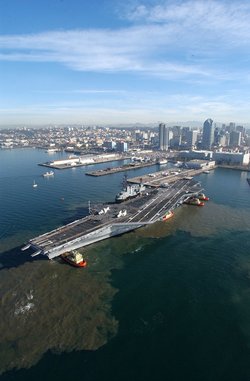 Midway prepares to moor at her final resting place at Navy pier in  where she will become the largest museum devoted to carriers and naval aviation. (Jan. 10, 2004)