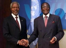  (left) with Mugabe (right)