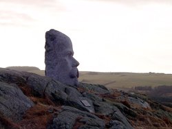 Sculpture in stone of Arne Garborg, located at his home in Knudaheio