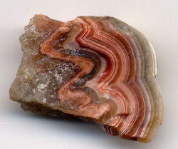 Banded agate. The specimen is one inch (2.5 cm) wide.
