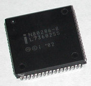 The Intel 80286  has a Quad Flat Package