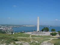 Obelisk of Glory on the Mount Mithradates. Kerch harbor is on the background.