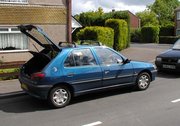 A blue  Peugeot 306