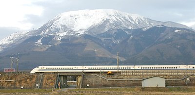 The  bullet train streaks past Mt. Ibuki before reaching .