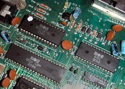 Image of the innards of a  showing some important MOS Technology circuits: the  and the .