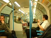 Inside a Victoria Line carriage at night