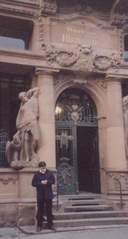 Me, in the front of the Universittsbibliothek (University Library) of Heidelberg, Germany, writing an sms :-)