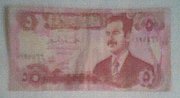 A five- note featuring Saddam Hussein