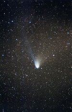Comet Hale-Bopp, showing a white dust tail and blue gas tail.  , February 1997.