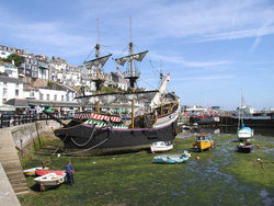 A replica of Sir Francis Drake's "the Golden Hind" permanently moored in Brixham Harbour.