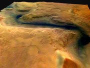 Oblique view of the Reull Vallis near the Hellas basin, rendered from data obtained by the Mars Express orbiter's High Resolution Stereo Camera (HRSC)