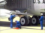 NASA technicians working on the X-43A prior to launch (March 27, 2004)