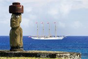 Moai in , with Chilean Navy training ship Buque Escuela Esmeralda cruising behind