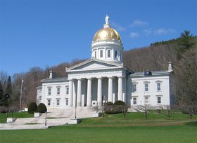 The   of the  () in  is visible for many miles around the city. The Capitol building is in the  architectural style and was completed in . It is built of  from the famous quarrys in the nearby town of , and has a  with  in the . Montpelier became the state capital in .
