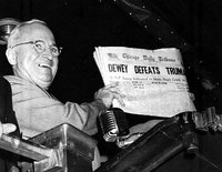 famous photograph of Truman grinning and holding up a copy of the newspaper with the erroneous headline
