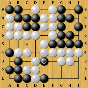 In the top right black has 4 eyes, making that group alive.  In the bottom left, black isn't so lucky.  It only has one eye, allowing that group to be taken. (With white playing at C3, then A5, then A3, then A1.)