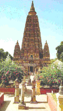 The temple is of bricks  and towers over its environs