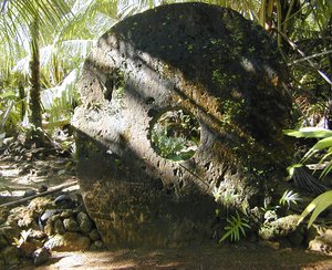 A large (approximately 8 feet in height) example of Yapese stone money in the village of Gachpar 