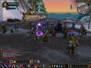 A large group of players in the  MMORPG are gathering for a raid.