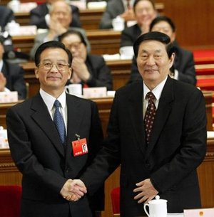 Zhu Rongji (right) with his successor Premier Wen Jiabao