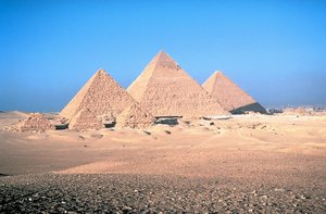 The . The largest pyramids, from left to right, are Menkaure's pyramid, Khafre's pyramid, and the Great Pyramid.