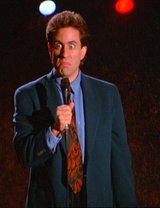 Jerry Seinfeld performing his famous stand-up comedy at the ending of an episode ("The Boyfriend Part. 2)