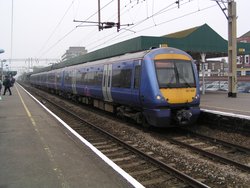  'Electrostar', no. 357036, at Southend Central on 29th March 2003. All c2c services are operated by these .